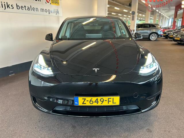 Tesla Model Y RWD 58 kWh Nederlandse auto | Panoramadak | Afneembare trekhaak | Stoelverwarming | Achteruitrijcamera | Parkeersensoren rondom | Lederen bekleding