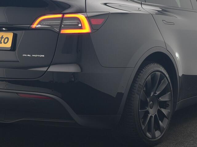 Tesla Model Y Dual Motor Long Range AWD 514pk | Trekhaak Afn. | Full Self-Driving Capability | Panodak | Adaptive Cruise | 360 Camera | Lederen Sportstoelen Memory & Verwarmd | Navigatie |