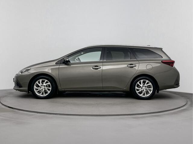 Toyota AURIS Touring Sports 1.8 Hybrid Dynamic | Stoelverwarming | Navigatie | Onderweg-naar-dealer