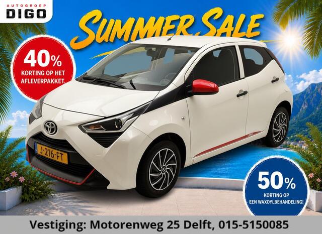 Toyota AYGO 1.0 VVT-i CORAL RED PACK 1e EIG. GARANTIE 7-2030* AIRCO. CARPLAY NAVI.PRIVACY GLASS. COMFORT PACK.100% OH
