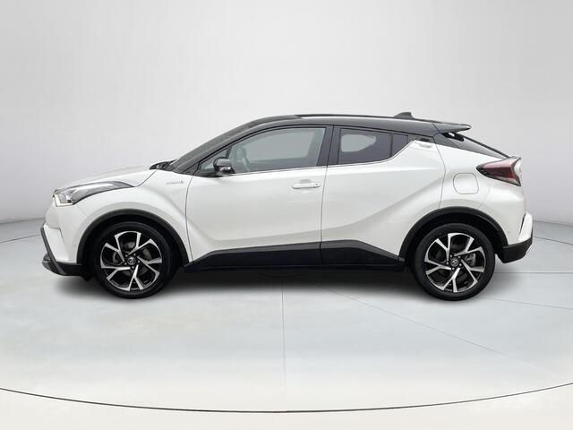 Toyota C-HR 1.8 Hybrid Bi-Tone **NAVIGATIE/ PARKEERSENSOREN/ STOELVERWARMING**