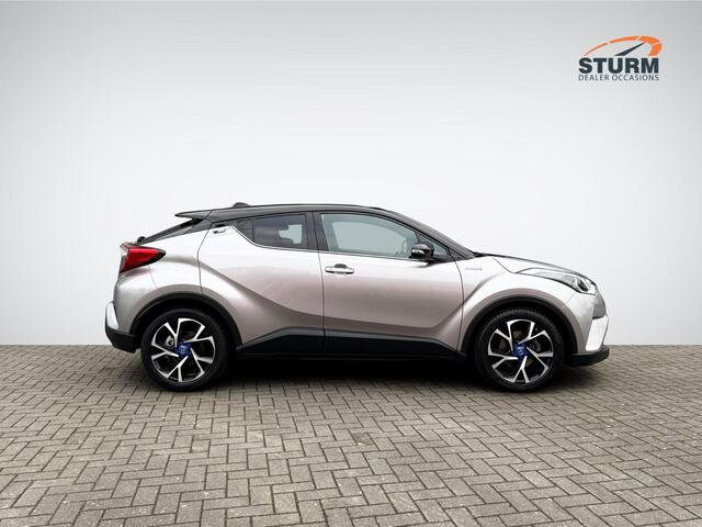 Toyota C-HR 1.8 Hybrid Bi-Tone | Trekhaak | Navigatie | Camera | Stoelverwarming | Adapt. Cruise Control | Two-Tone Lakkleur | Rijklaarprijs!