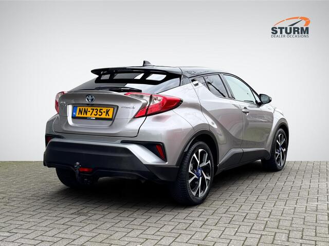 Toyota C-HR 1.8 Hybrid Bi-Tone | Trekhaak | Navigatie | Camera | Stoelverwarming | Adapt. Cruise Control | Two-Tone Lakkleur | Rijklaarprijs!