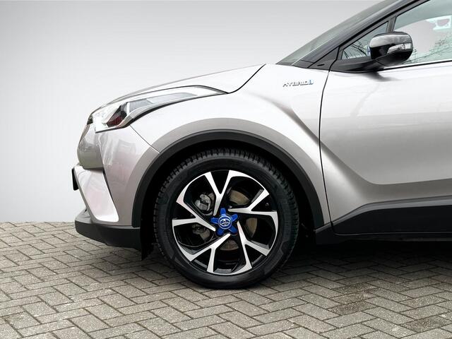 Toyota C-HR 1.8 Hybrid Bi-Tone | Trekhaak | Navigatie | Camera | Stoelverwarming | Adapt. Cruise Control | Two-Tone Lakkleur | Rijklaarprijs!