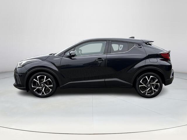 Toyota C-HR 1.8 Hybrid First Edition **NAVIGATIE/ JBL/ DODEHOEKDETECTIE/ STOELVERWARMING**