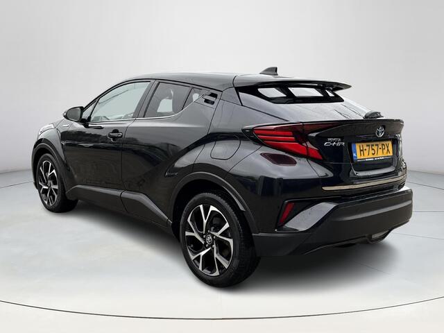 Toyota C-HR 1.8 Hybrid First Edition **NAVIGATIE/ JBL/ DODEHOEKDETECTIE/ STOELVERWARMING**
