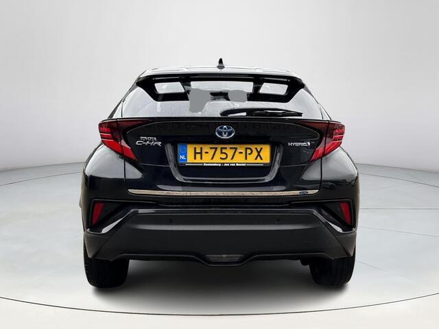Toyota C-HR 1.8 Hybrid First Edition **NAVIGATIE/ JBL/ DODEHOEKDETECTIE/ STOELVERWARMING**