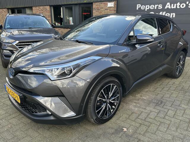 Toyota C-HR bi-tone 1.8 Hybrid Style Navi. Cruise. nl auto dealer onderhouden . stoelverwarming .enz dealer onderhouden NL Auto