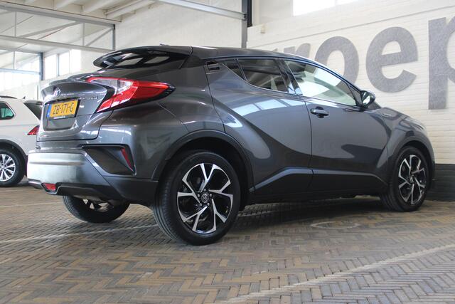 Toyota C-HR 1.8 Hybrid Dynamic | Incl. 12 maanden garantie | Dealeronderhouden | Stoelverwarming | Climate control | Cruise control | Lane assist | Parkeercamera | Navigatie |