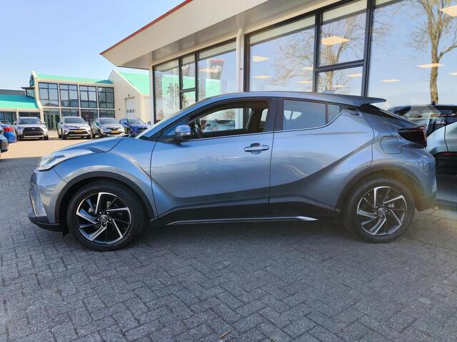 Toyota C-HR 2.0 Hybrid Dynamic 184 PK | Sideskirts | All-Season | Clima | Cruise | Navi | Camera