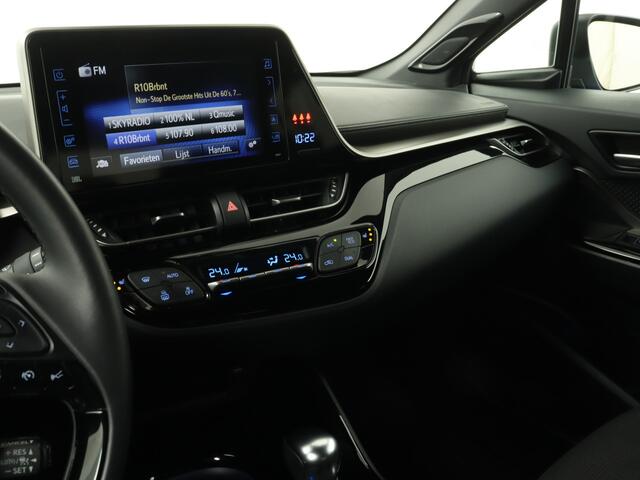 Toyota C-HR 1.8 Hybrid Bi-Tone | Trekhaak | Dodehoek Ass. | Navigatie | Camera | LM velgen | JBL | Parkeer Ass. | LM velgen |
