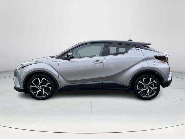 Toyota C-HR 1.8 Hybrid Bi-Tone Plus | Lederen bekleding | Stoel- + stuurverwarming | LED koplampen | Parkeersensoren |