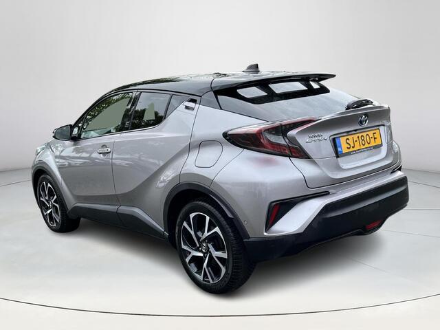 Toyota C-HR 1.8 Hybrid Bi-Tone Plus | Lederen bekleding | Stoel- + stuurverwarming | LED koplampen | Parkeersensoren |