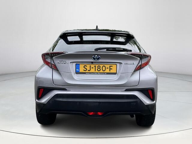 Toyota C-HR 1.8 Hybrid Bi-Tone Plus | Lederen bekleding | Stoel- + stuurverwarming | LED koplampen | Parkeersensoren |