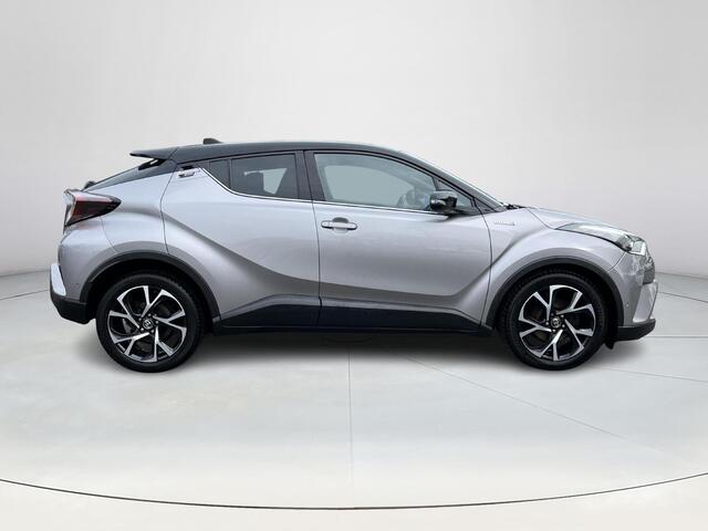Toyota C-HR 1.8 Hybrid Bi-Tone Plus | Lederen bekleding | Stoel- + stuurverwarming | LED koplampen | Parkeersensoren |