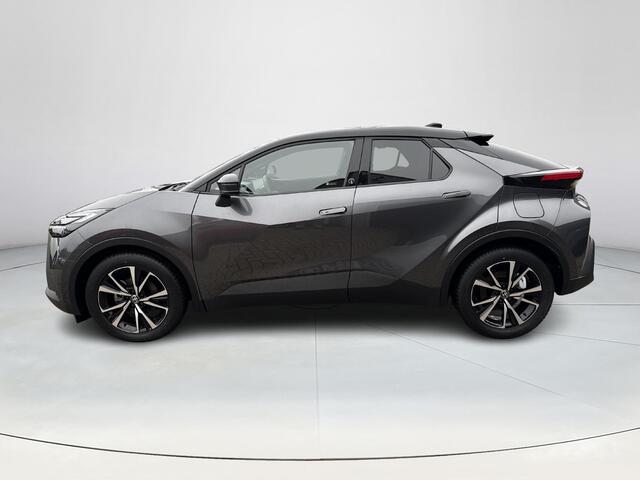Toyota C-HR 1.8 Hybrid 140 First Edition **NAVIGATIE/ STUUR- EN STOELVERWARMING/ ELEK. ACHTERKLEP/ DODEHOEKDETECTIE/ 36 MAANDEN GARANTIE**