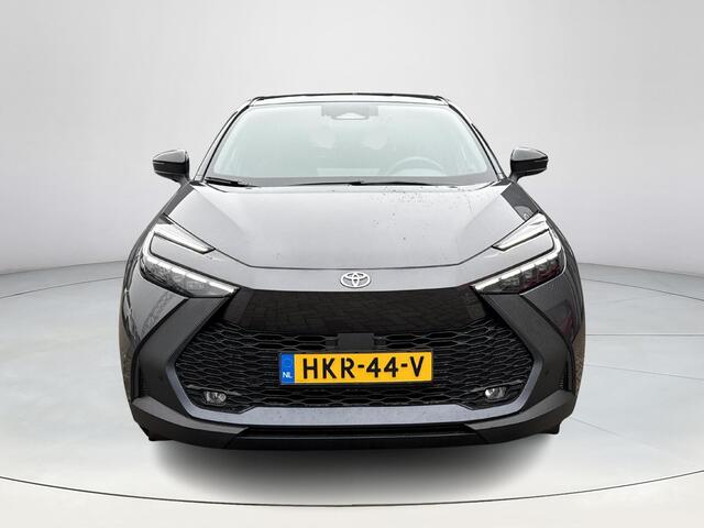 Toyota C-HR 1.8 Hybrid 140 First Edition **NAVIGATIE/ STUUR- EN STOELVERWARMING/ ELEK. ACHTERKLEP/ DODEHOEKDETECTIE/ 36 MAANDEN GARANTIE**
