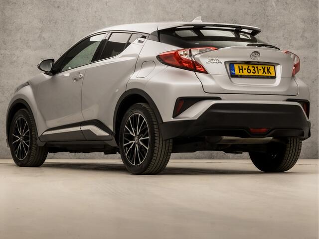 Toyota C-HR 1.2 Bi-Tone (NAVIGATIE, CAMERA, LEDER, GETINT GLAS, SPORTSTOELEN, PARKEERSENSOREN, CRUISE, ZWART HEMEL, NIEUWE APK, NIEUWSTAAT)