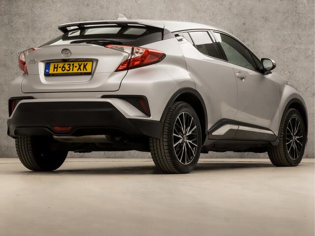 Toyota C-HR 1.2 Bi-Tone (NAVIGATIE, CAMERA, LEDER, GETINT GLAS, SPORTSTOELEN, PARKEERSENSOREN, CRUISE, ZWART HEMEL, NIEUWE APK, NIEUWSTAAT)