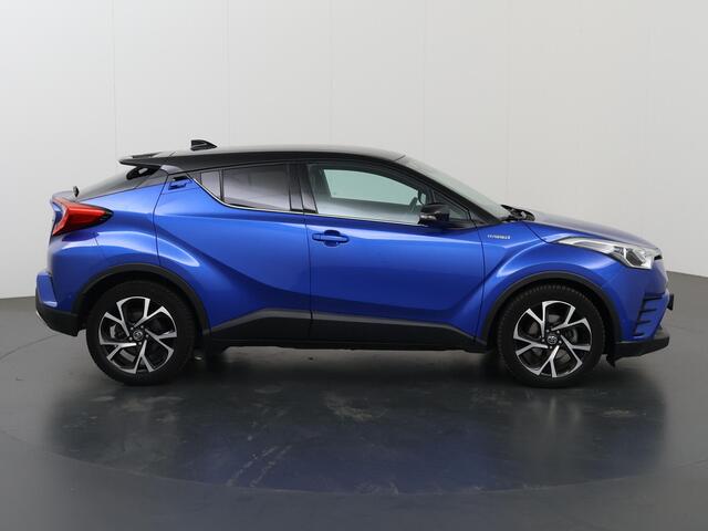 Toyota C-HR 1.8 Hybrid Bi-Tone | Leder | Stoelverwarming | Keyless | Navigatie | Climate Control |