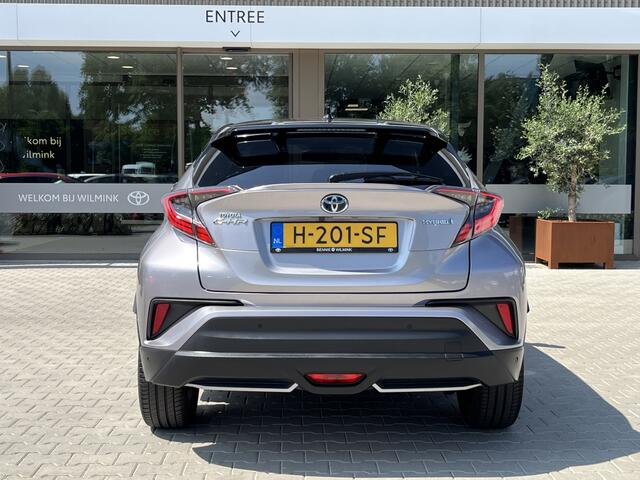 Toyota C-HR 1.8 Hybrid Bi-Tone Plus | Navigatie | Adaptive Cruise | Camera |