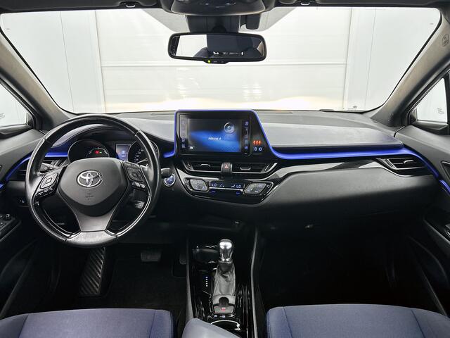 Toyota C-HR 1.8 Hybrid Bi-Tone Limited | Stoelverwarming | Camera | Adaptive cruise control | 18'' LM velgen |