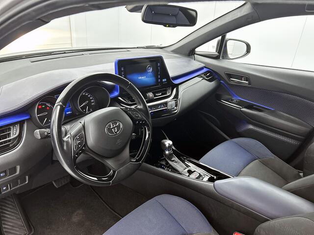 Toyota C-HR 1.8 Hybrid Bi-Tone Limited | Stoelverwarming | Camera | Adaptive cruise control | 18'' LM velgen |