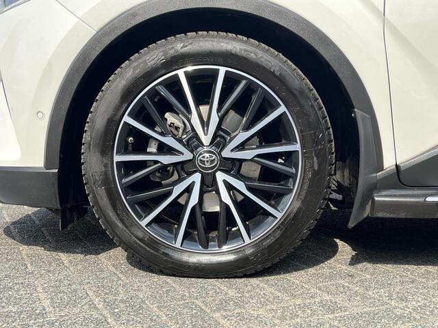 Toyota C-HR 1.8 Hybrid Premium | LED Koplampen | Stoel- + stuurverwarming | Navigatie | Sideskirts |