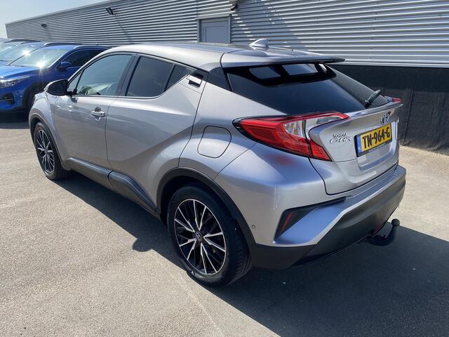 Toyota C-HR 1.8 Hybrid Bi-Tone Plus Trekhaak, dodehoek detectie, navigatie, stoel- & stuurverwarming, achteruitrij camera, parkeersensoren, lederen bekleding, Volledig dealeronderhouden