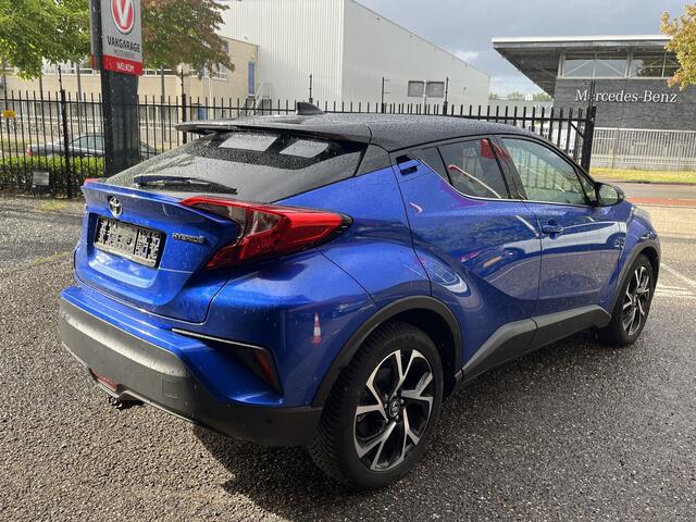 Toyota C-HR 1.8 Hybrid Bi-Tone // NAVI // CAMERA // DODENHOEK SENSOR // TREKHAAK // ADAPTIVE CRUISE //