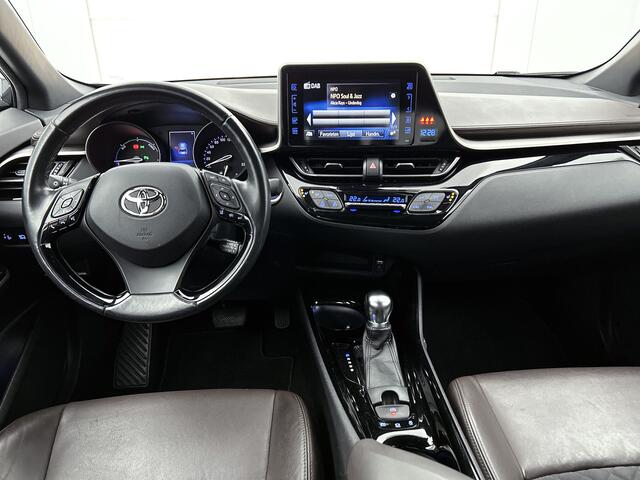 Toyota C-HR 1.8 Hybrid Executive | Trekhaak | Half leer | Parkeersensoren