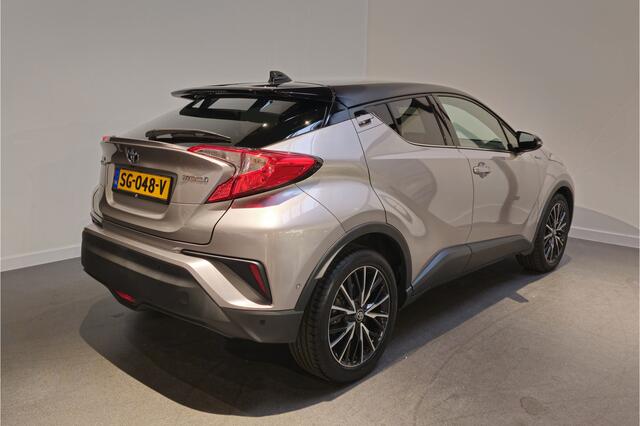 Toyota C-HR 1.8 Hybrid Style Bi-Tone - Stoelverwarming - Adaptive Cruise - Dodehoekdetectie - JBL Audio