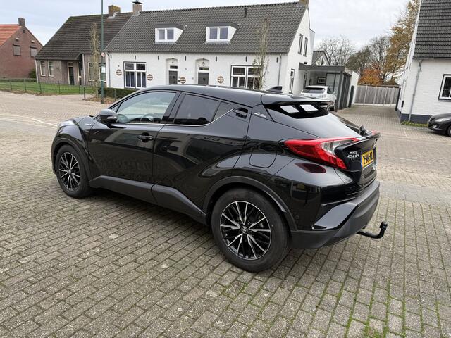 Toyota C-HR 1.8 Hybrid Bi-tone Trekhaak, Keyless entry, Keyless starten