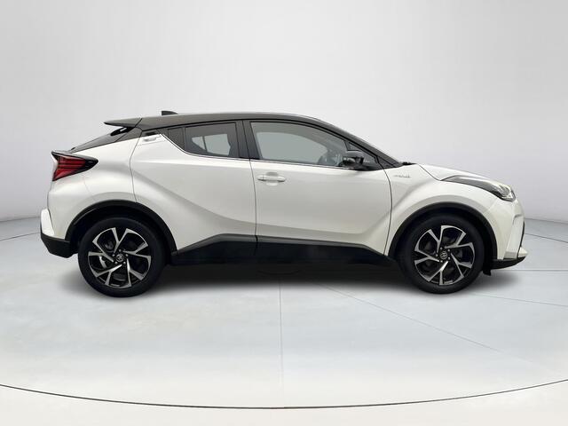 Toyota C-HR 1.8 Hybrid Bi-Tone | Carplay | Dode hoek waarschuwing | Stoelverwarming | Keyless entry |