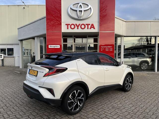 Toyota C-HR 1.8 Hybrid Style Bi-Tone | Rijklaar | NL-Auto | Navi | Stoel en stuurverwarming | Parkeersensoren