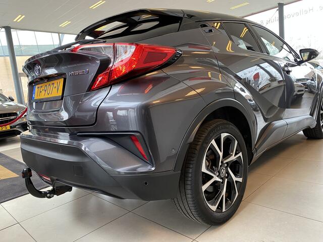 Toyota C-HR 1.8 Hybrid Bi-Tone,Automaat,Navigatie,Achteruitrijcamera,Climate&Cruisecontrol Adaptief,Trekhaak,Spraakbediening,Keyless,Stoelverwarming,V&A Sensoren,DAB,Dealer Onderhouden,18 Inch Lmv