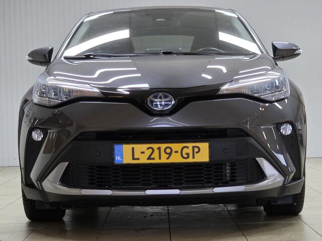 Toyota C-HR 1.8 Hybrid Dynamic/ DEALER ONDERHOUDEN!/ Side-Steps/ 18'' LMV/ Camera/ Keyless/ Lane-Assist./ Adaptive Cruise/ Grootlicht Assist./ LED Koplampen/ Navi/ Clima/ Cruise/ Bluetooth/ Extra getint glas.