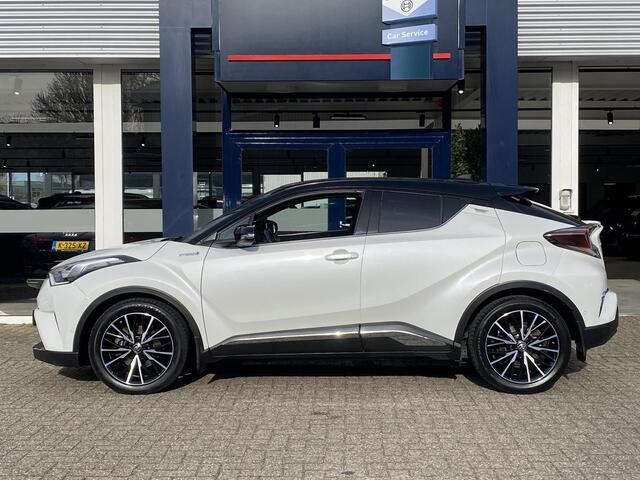 Toyota C-HR 1.8 Hybrid Bi-Tone / Automaat / Adaptieve Cruise-Control / Stoelverwarming / JBL-Audio / Dodehoek-Detectie / Afneembare-Trekhaak / Keyless / Climate-Control / Radio-Bluetooth / Navi / Camera / PDC V+A / 18'' LMV / All-Season / ENZ.
