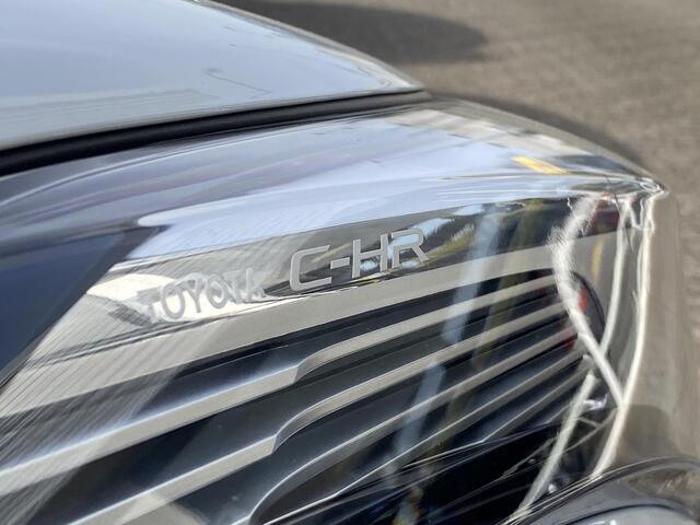 Toyota C-HR 1.8 Hybrid Bi-Tone / Automaat / Adaptieve Cruise-Control / Stoelverwarming / JBL-Audio / Dodehoek-Detectie / Afneembare-Trekhaak / Keyless / Climate-Control / Radio-Bluetooth / Navi / Camera / PDC V+A / 18'' LMV / All-Season / ENZ.