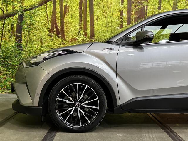 Toyota C-HR 1.8 Hybrid Executive Automaat 18 Inch JBL Leder Stof Navi Camera LED Trekhaak Rijstrook ACC