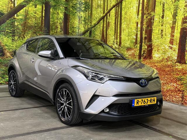 Toyota C-HR 1.8 Hybrid Executive Automaat 18 Inch JBL Leder Stof Navi Camera LED Trekhaak Rijstrook ACC