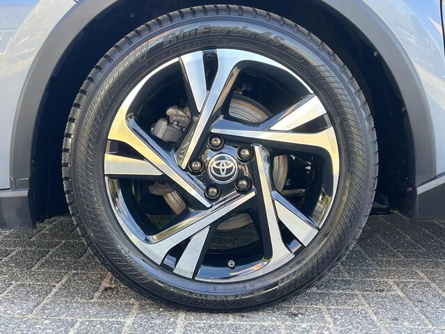 Toyota C-HR 1.8 Hybrid Executive | Stoel- + stuurverwarming | Carplay | Parkeersensoren | Dode hoek waarschuwing |