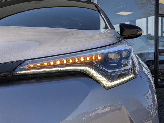 Toyota C-HR 1.8 Hybrid Bi-Tone | Stoelverw. | Dodehoek | Camera | ACC | Keyless | LED-pakket