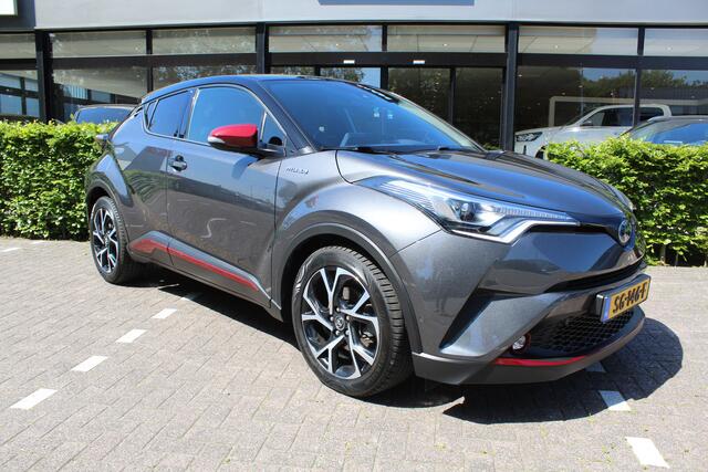 Toyota C-HR 1.8 Hybrid Bi-Tone | Rijklaar | Stoel-/stuurverw. | Blind Spot | Trekhaak | PDC | Camera | All-season | Adap.cruise