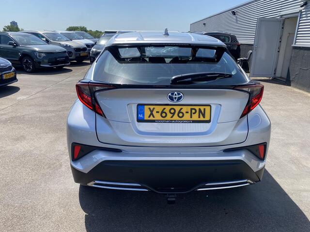 Toyota C-HR 2.0 Hybrid Dynamic Trekhaak, Dodehoekdetectie, Smart Key, Parkeersensoren, Privacy glass, All-season banden, LMV, NL-auto