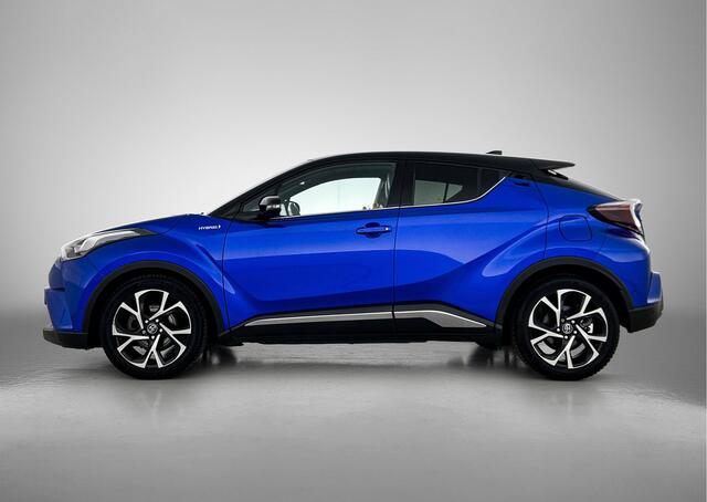 Toyota C-HR 1.8 Hybrid Bi-tone Plus | Dealer onderhouden | JBL | Dodehoek detectie | Stoel+stuurverwarm0ing | Parkeersensoren voor+achter met assistent | Trekhaak afneembaar | Lederen bekleding | Navigatie | volledig LED |