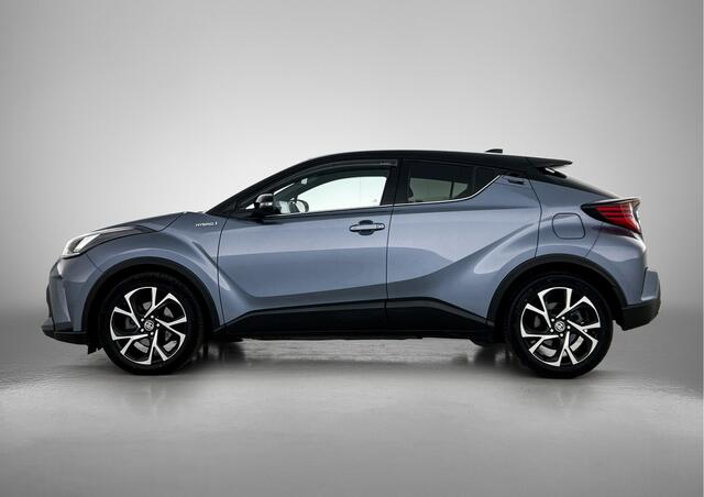 Toyota C-HR 2.0 Hybrid Style Bi-Tone | Dodehoek detectie | Parkeersensoren voor+achter | FULL LED Verlichting | Navigatie | Apple CarPlay/Android auto | Stoelverwarming | Climate control |
