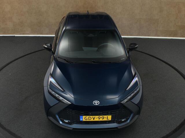 Toyota C-HR 1.8 Hybrid 140 First Edition - ORIGINEEL NEDERLANDSE AUTO - AFKOMSTIG VAN 1E EIGENAAR - ELEKTRISCHE ACHTERKLEP - 18 INCH LICHT METALEN VELGEN - PARKEERASSISTENT - PARKEERSENSOREN VOOR/ ACHTER - NAVIGATIE - DRAADLOZE TELEFOONLADER - APPLE CARPLAY/ ANDROID AUTO - ELEKTRISCH INKLAPBARE BUITENSPIEGELS
