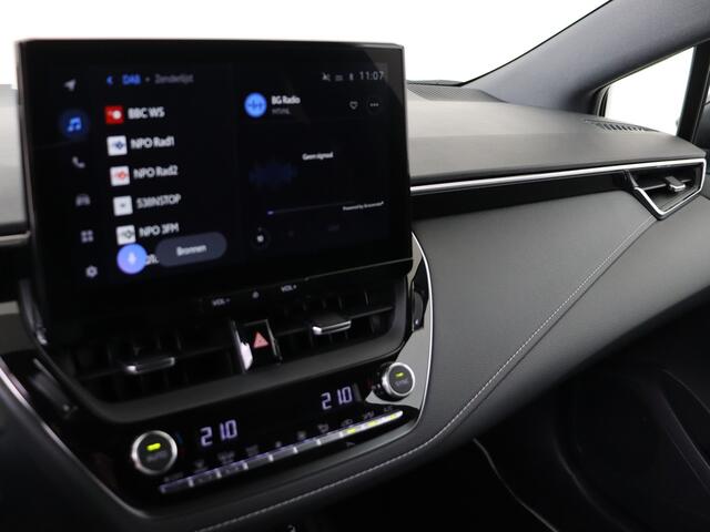 Toyota COROLLA Touring Sports 2.0 High Power Hybrid First Edition *demo | Elektrische achterklep | navigatie | Climate Control | cruise control/Adaptive | stoelverwarming | Draadloos opladen | Sensoren V+A |