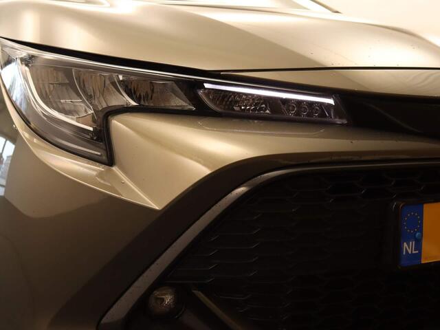 Toyota COROLLA 1.8 Hybrid Dynamic APPLE CARPLAY/ANDROID AUTO - STUUR + STOELVERWARMING - DRAADLOZE TELEFOONLADER - ADAPTIEVE CRUISE CONTROL - KEYLESS ENTRY/ START - DAB RADIO - LICHT/ REGENSENSOR - 4 X ELEKTRISCHE RAMEN